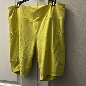 Plus size yellow bike shorts with pockets athletic